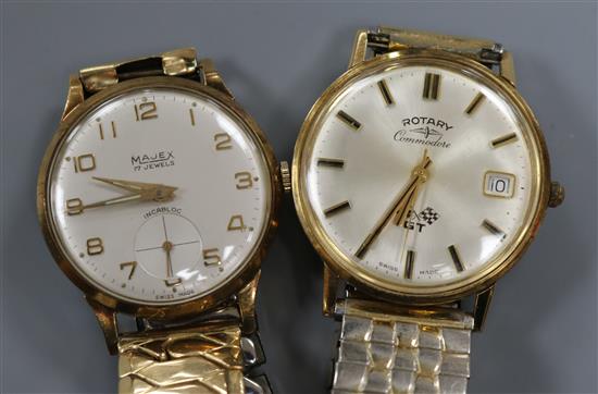 A gentlemans 9ct gold Majex wrist watch and a yellow metal Rotary Commodore GT wrist watch.